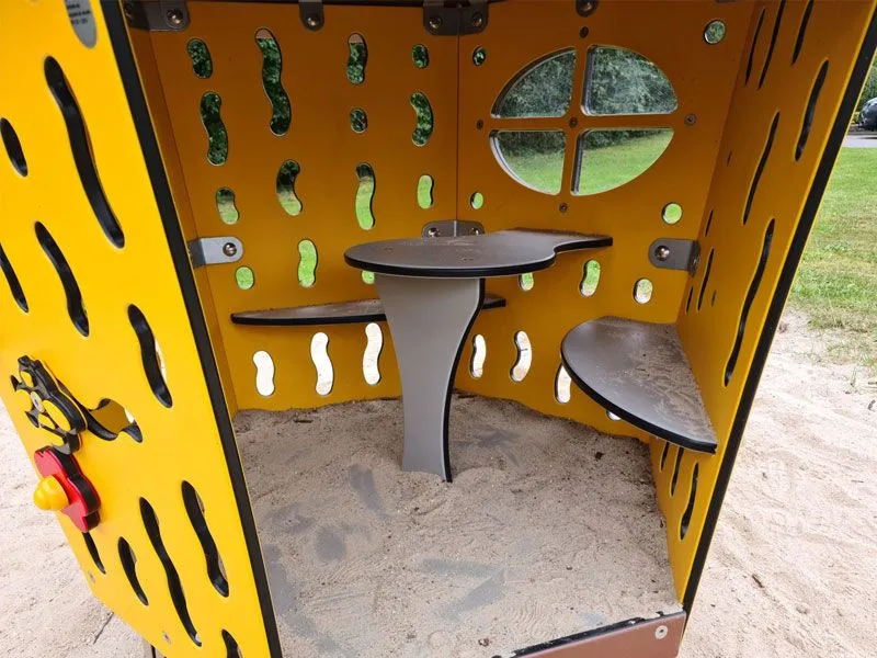 Alfred playhouse interior with table and 2 benches Alfred playhouse interior with table and 2 benches